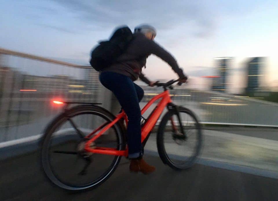 Easy E-Biking - man riding city e-bike fast, helping to make electric biking practical and fun