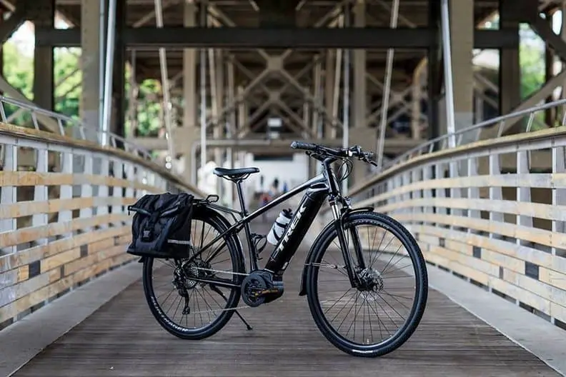 Easy E-Biking - TREK e-bike on a bridge, helping to make electric biking practical and fun