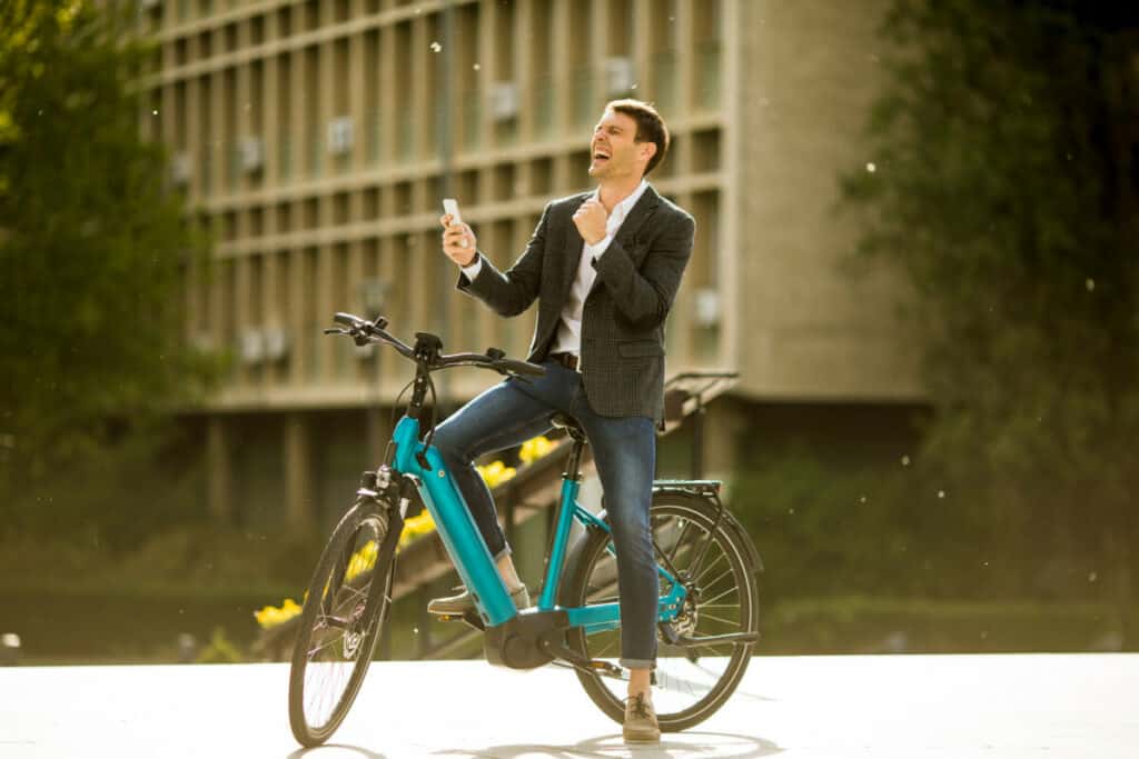 Easy E-Biking - businessman e-bike city, helping to make electric biking practical and fun