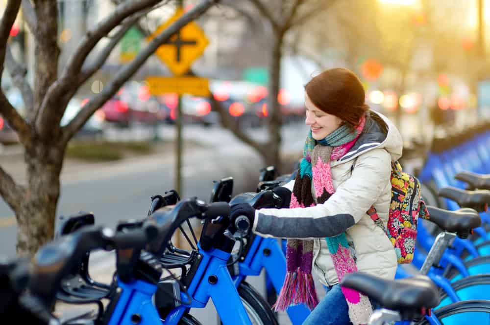 Easy E-Biking - Woman renting e-bike city, helping to make electric biking practical and fun